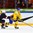 HELSINKI, FINLAND - DECEMBER 28: Sweden's Dmytro Timashov #17 pulls the puck away from USA's Ryan Donato #19 during preliminary round action at the 2016 IIHF World Junior Championship. (Photo by Matt Zambonin/HHOF-IIHF Images)

